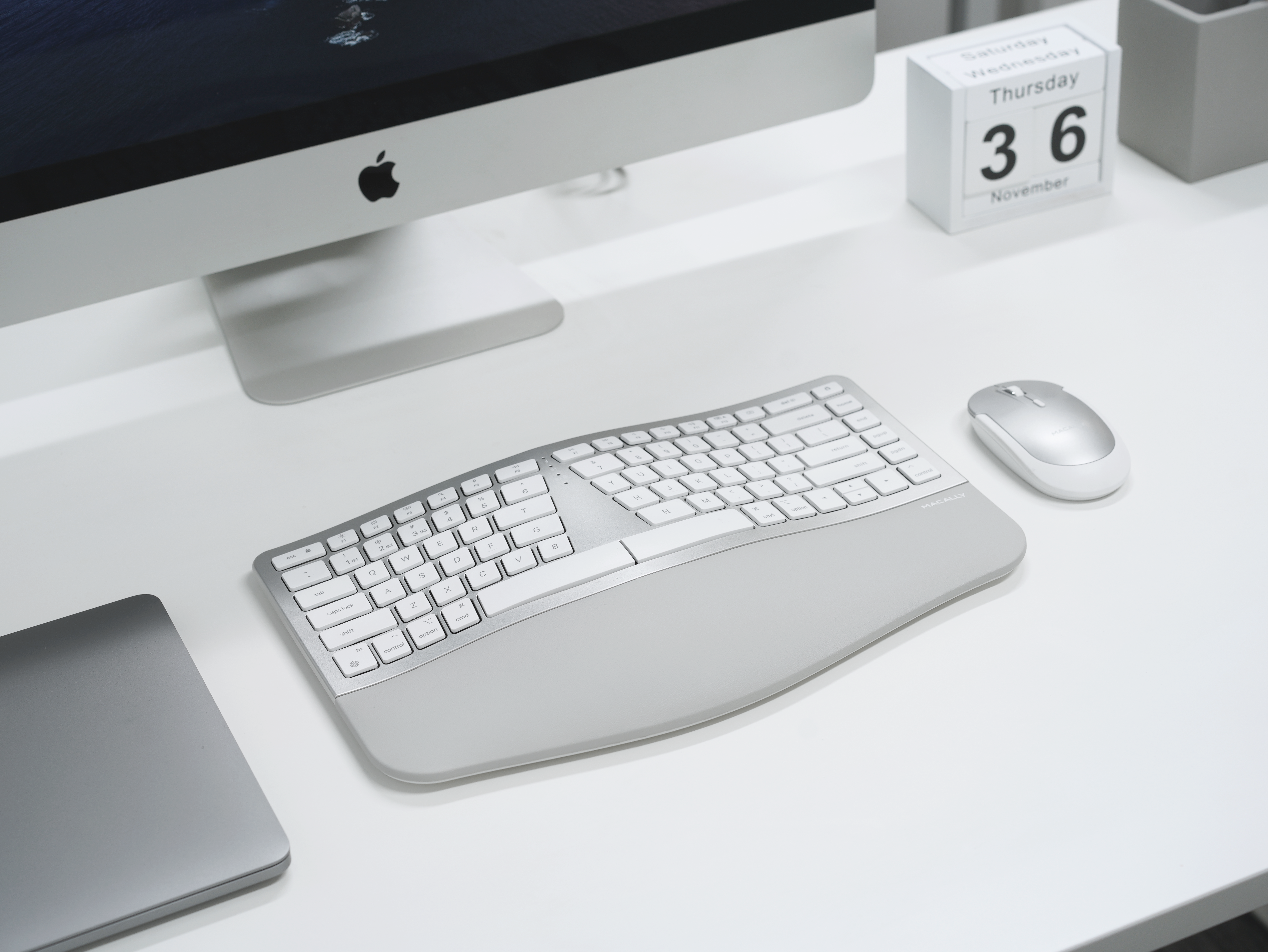 Macally Compact Ergonomic Keyboard full view on a Mac desk