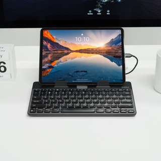 Macally USB-C wired keyboard with tablet stand in black - iPad workstation on a desk