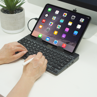 Macally USB-C wired keyboard with tablet stand in black - typing on iPad